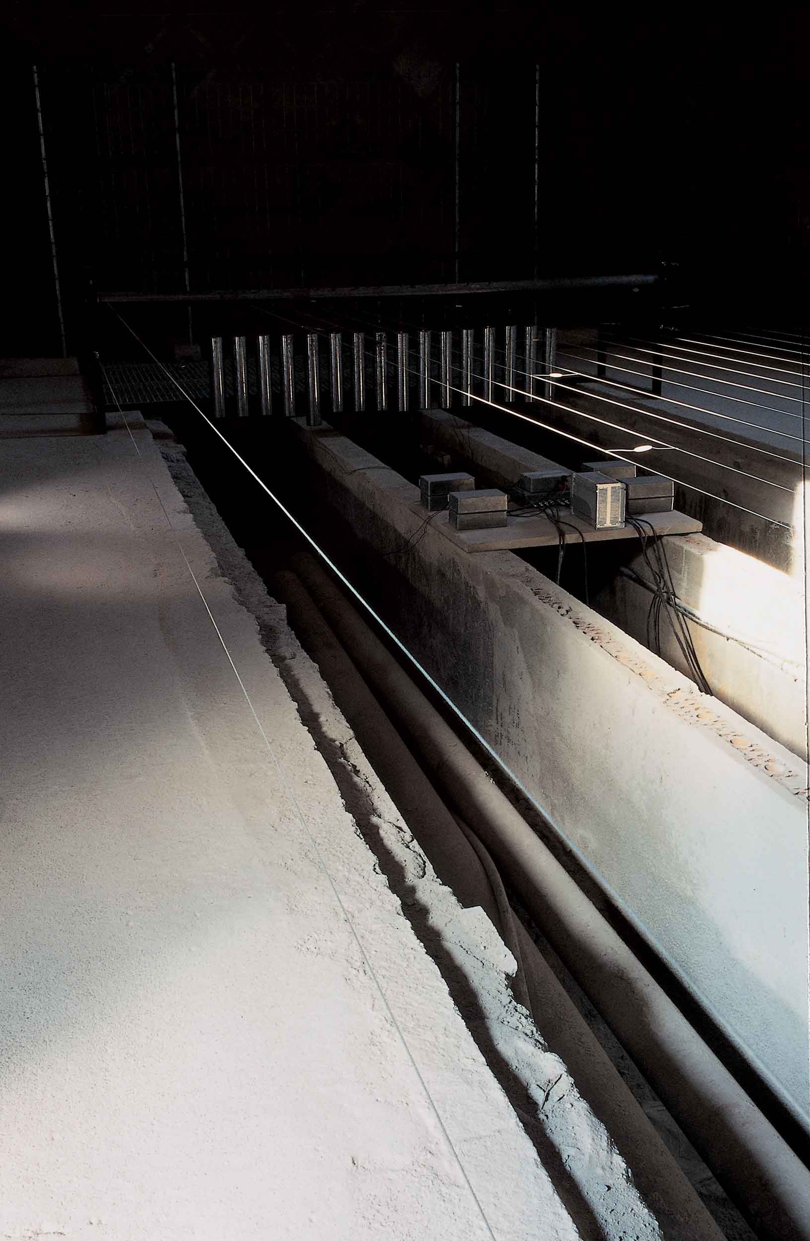 Off-Sonic: close-up of concrete floor and old pipes