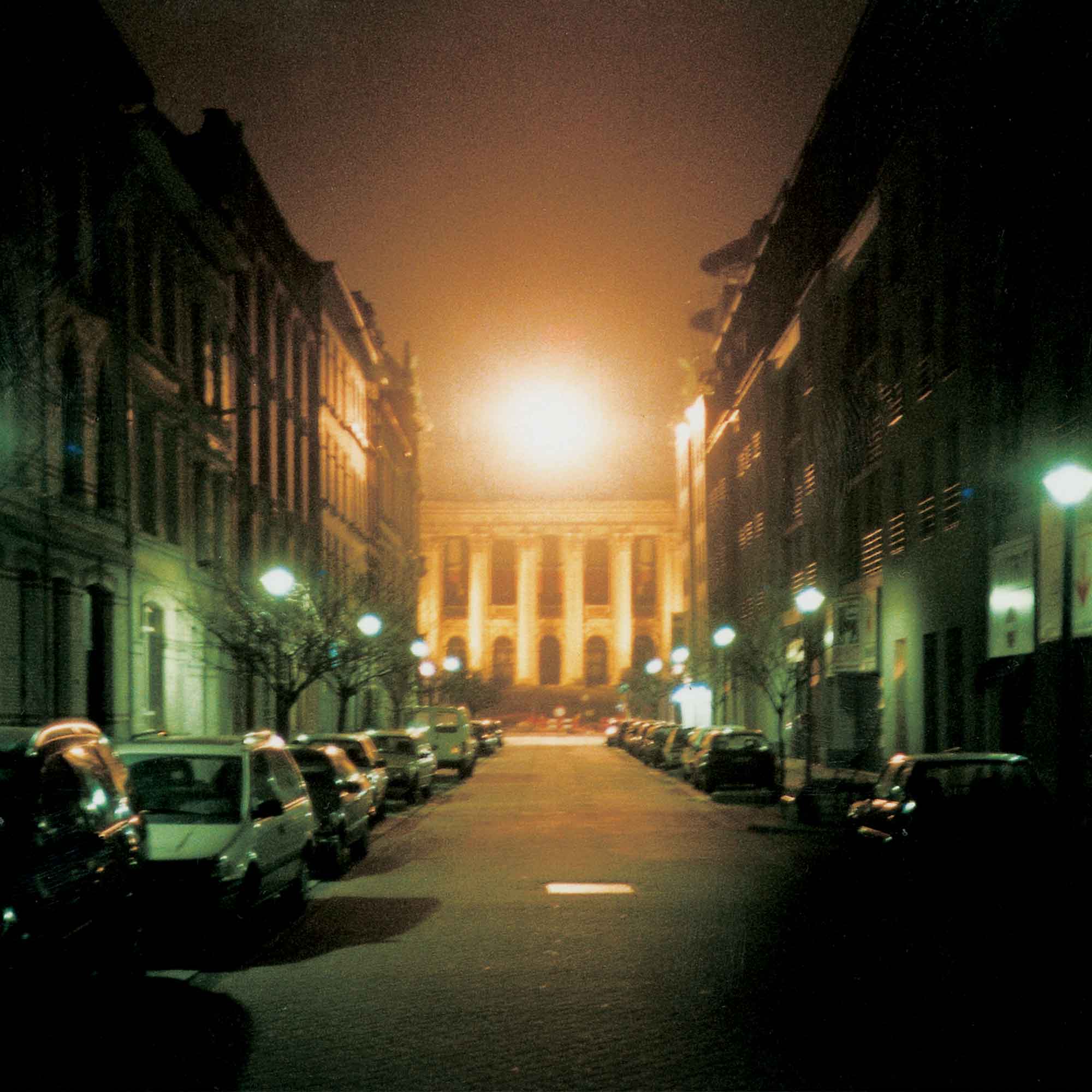 Ambient City 99 Radio Project: view onto exhibition building from streets by night