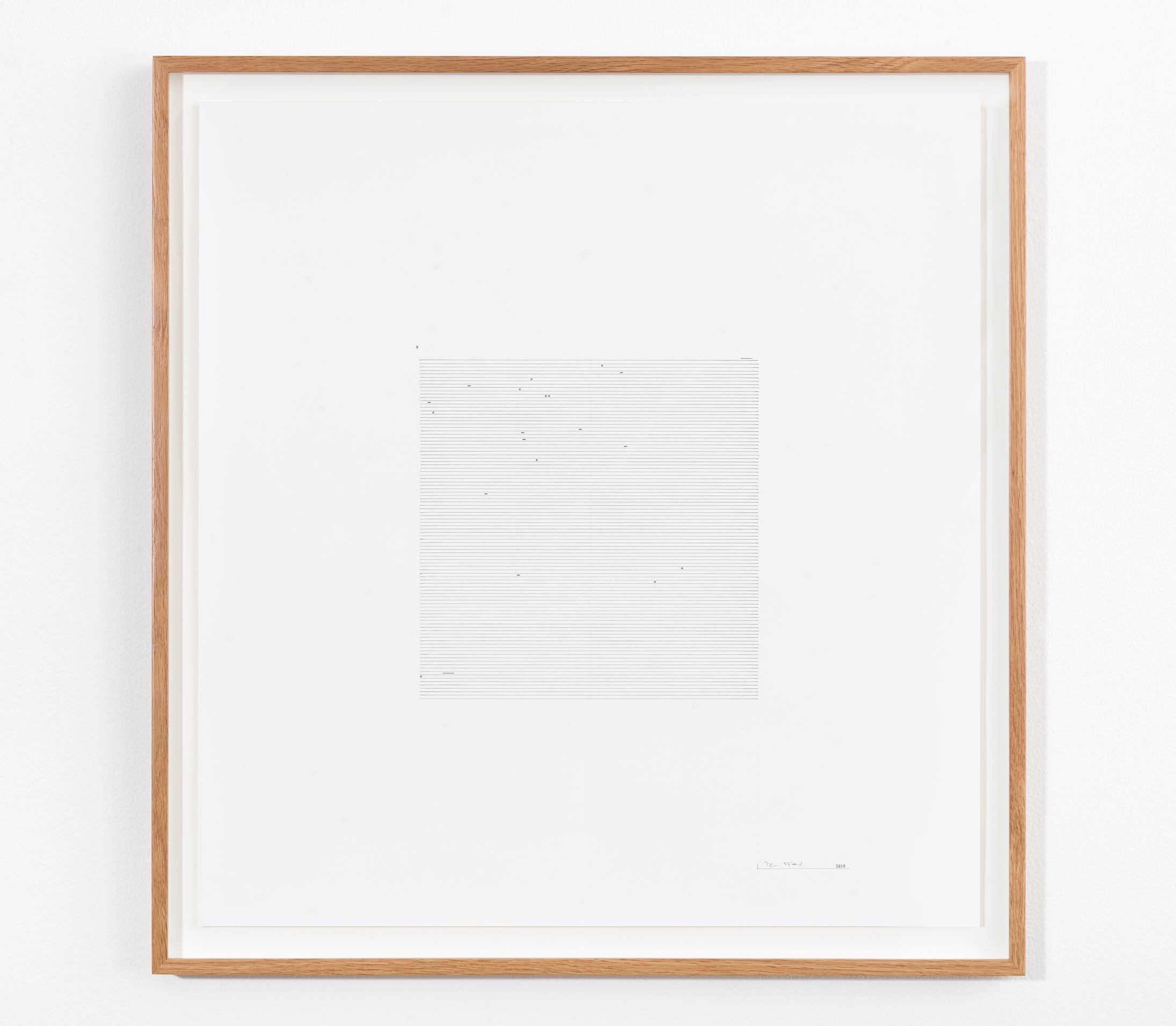 100 Years 1 in wooden frame hung on white wall