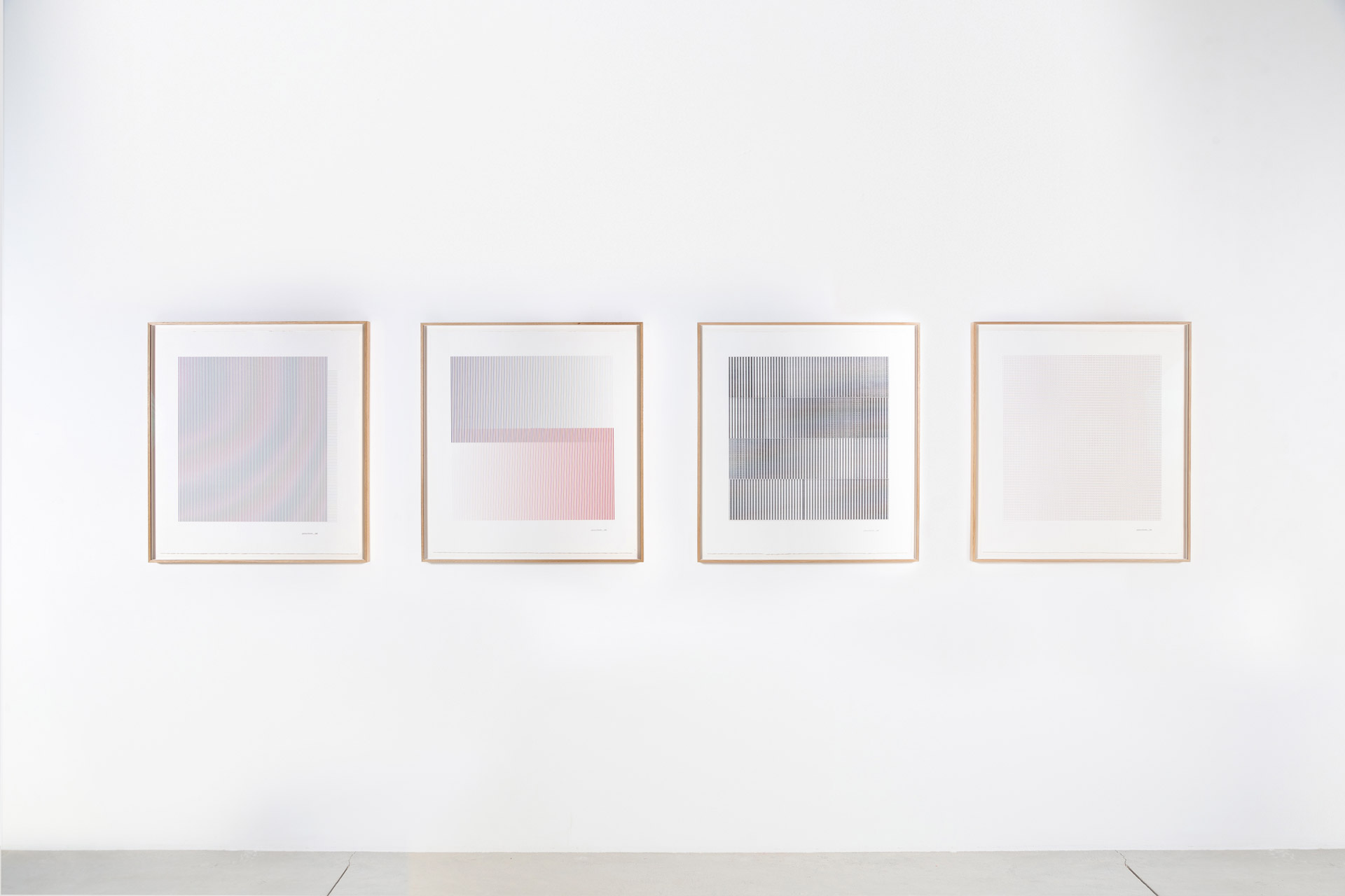 Moiré pattern prints; total of all four framed prints and hung horizontally on a wall