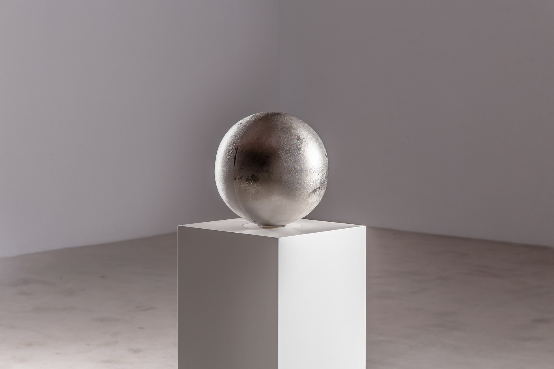 Frozen Sphere; artwork placed on pedestal